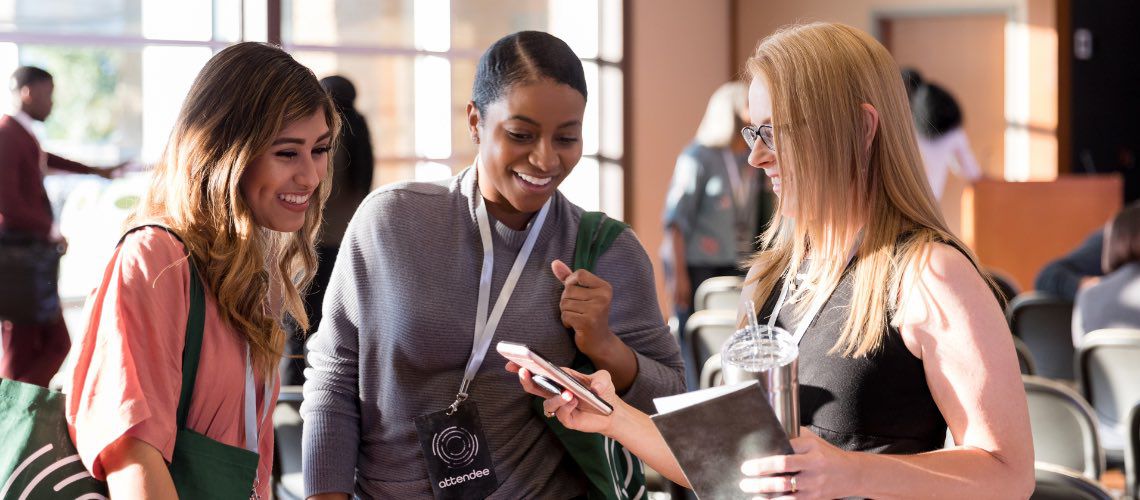 Group of women at a conference.